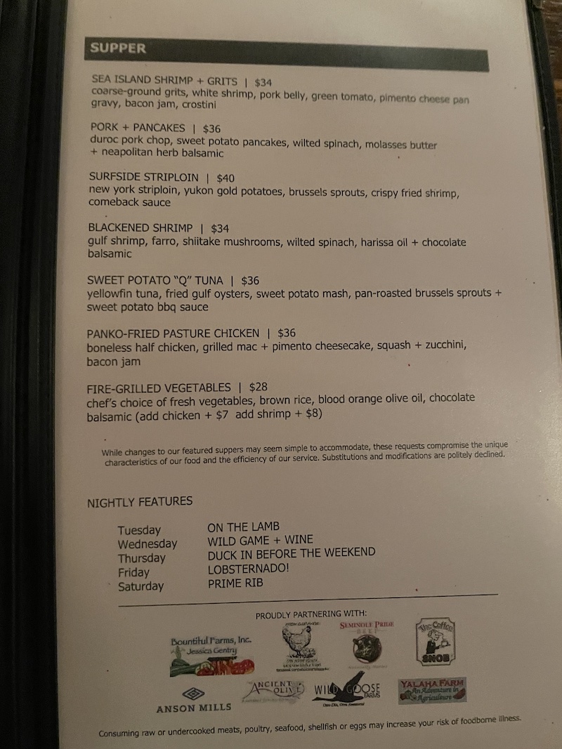 Restaurant menu showing appetizers and From the Grill selections