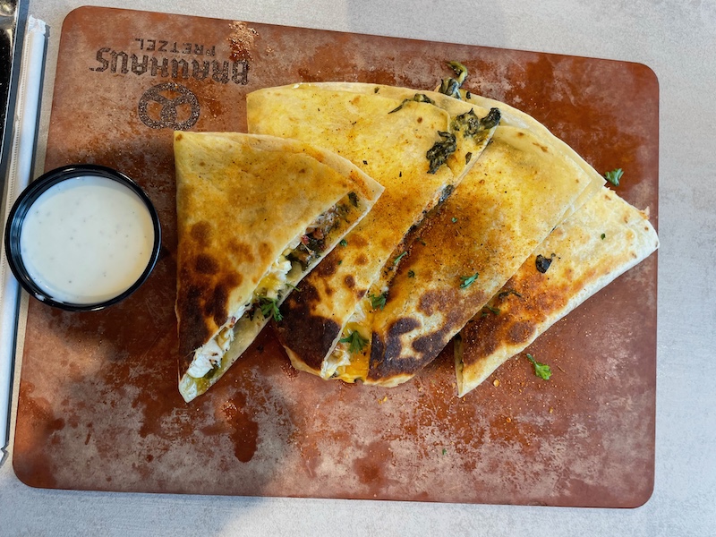 Crispy brisket quesadilla filled with smoky cheese.