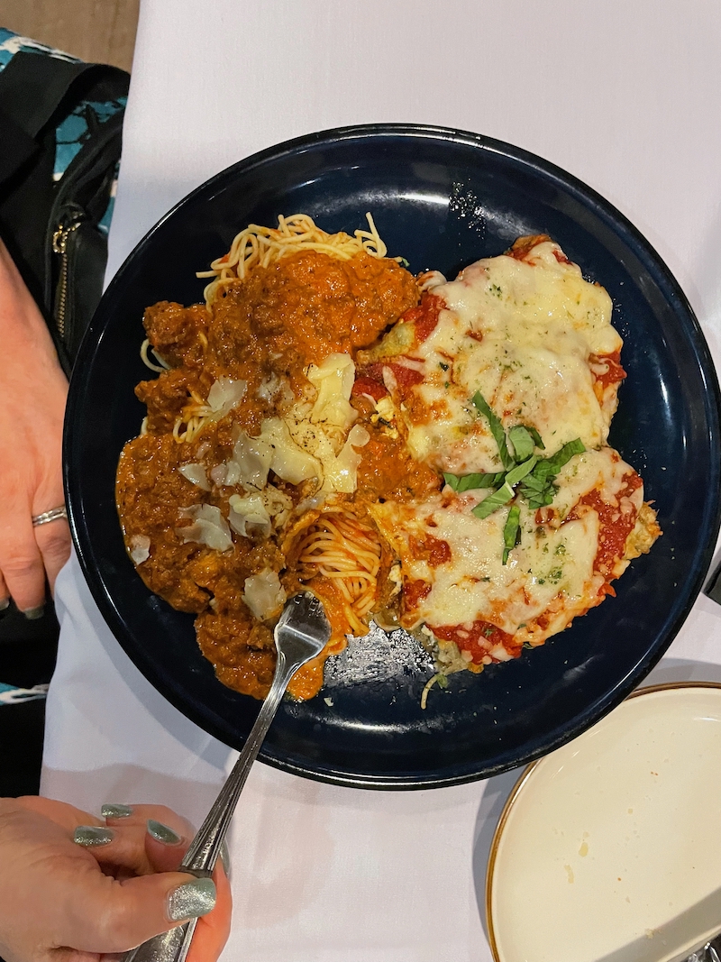 Eggplant parmesan served with spaghetti