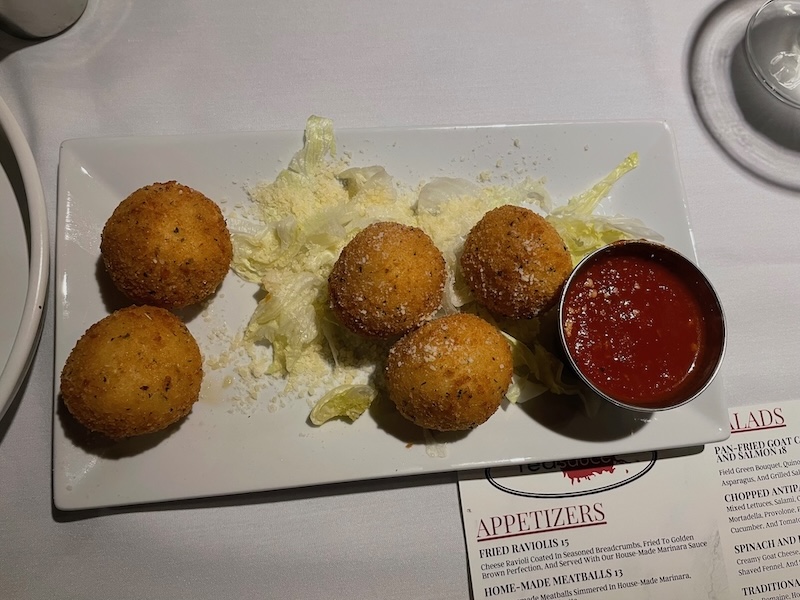 Full plate of arancini appetizer at RedSauce Lake Sumter Landing The Villages