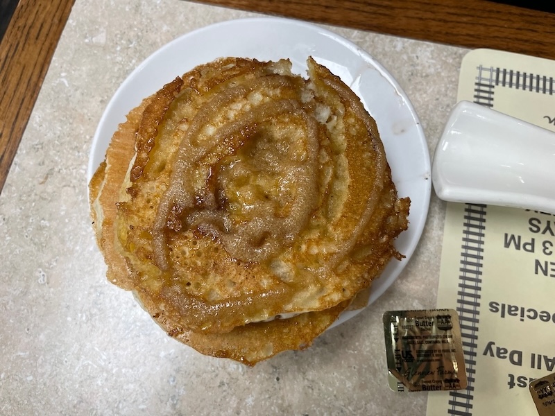Cinnamon swirl pancakes at Breakfast Station crispy edges and soft center