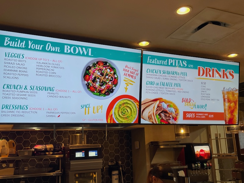 Menu board featuring pitas and drinks at Luma Mediterranean Kitchen Sawgrass Grove
