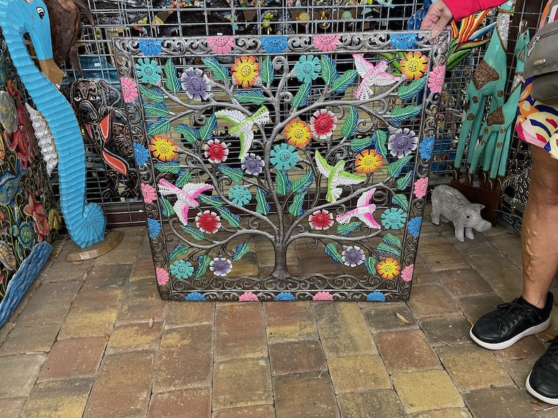 Metal wall art display at Barberville Yard Art with hummingbirds
