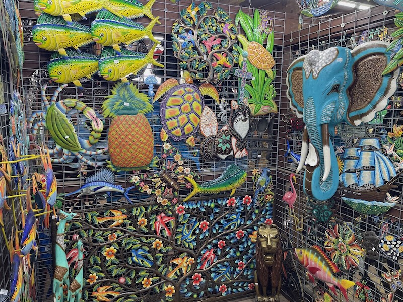 Large colorful wall art display at Barberville Yard Art