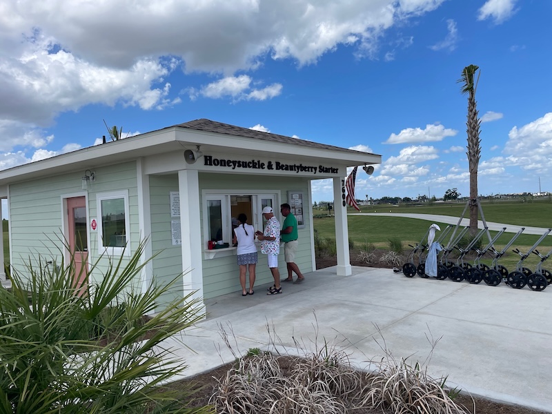 Honeysuckle and Beautyberry starter shack with push carts lined up