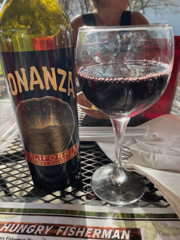 Glass of Bonanza Cabernet wine served at Fisherman’s Cove