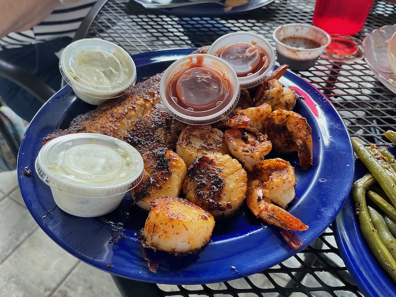Captain’s platter with scallops, shrimp, and fish served with dipping sauces