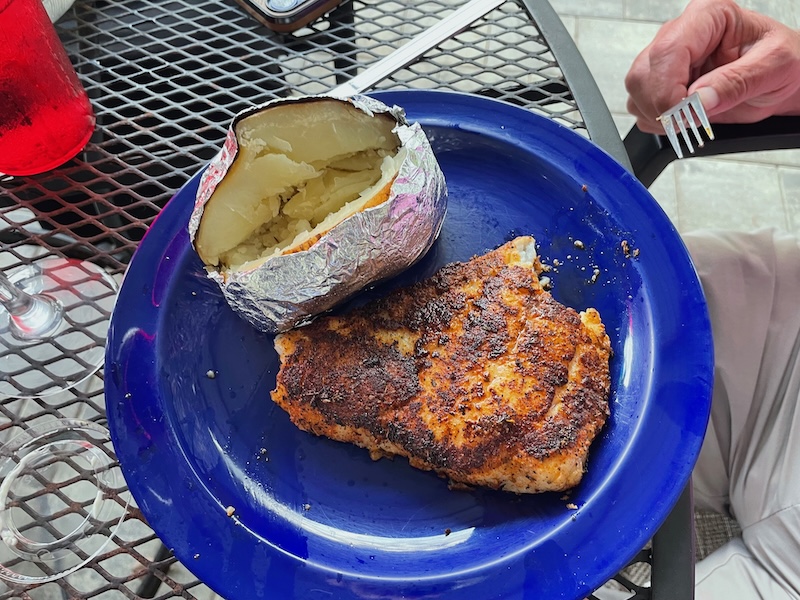 Blackened fish with baked potato at Fisherman’s Cove