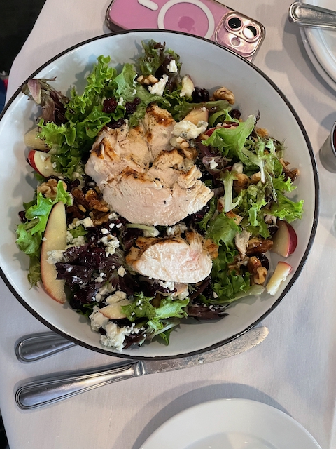 Cran apple chicken salad with walnuts, apples, and mixed greens