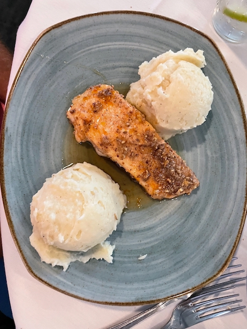 Maple pecan salmon served with mashed potatoes