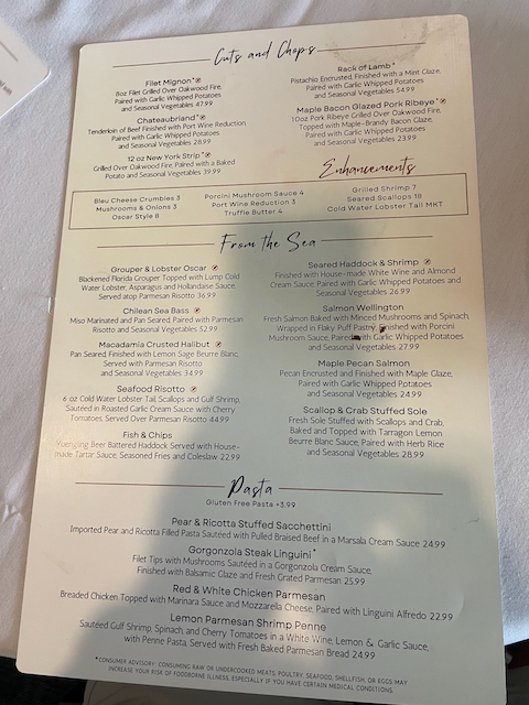 Entrees menu featuring steaks, seafood, and pasta dishes