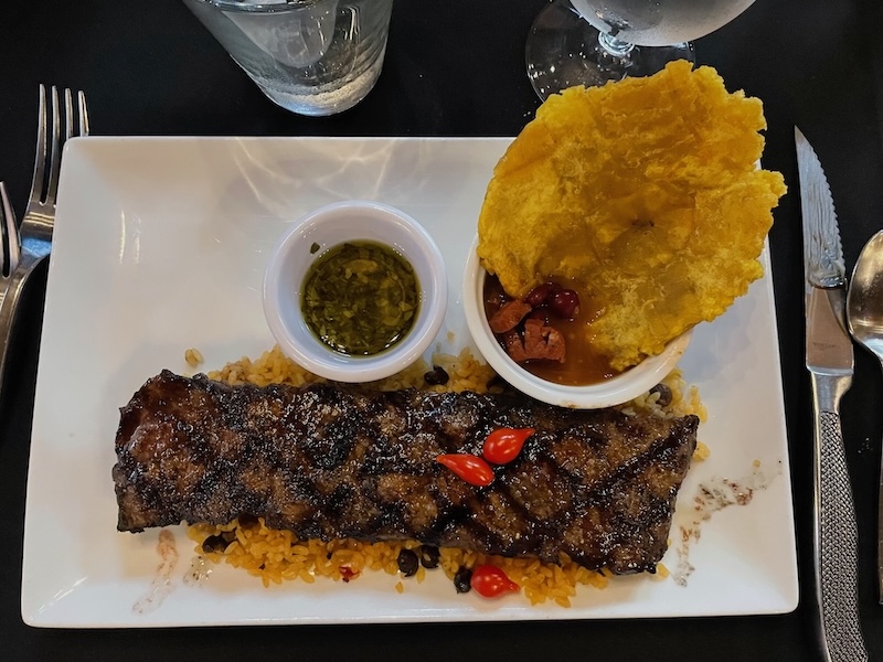 Churrasco steak with tostones and beans at Prime 3 on Main Leesburg