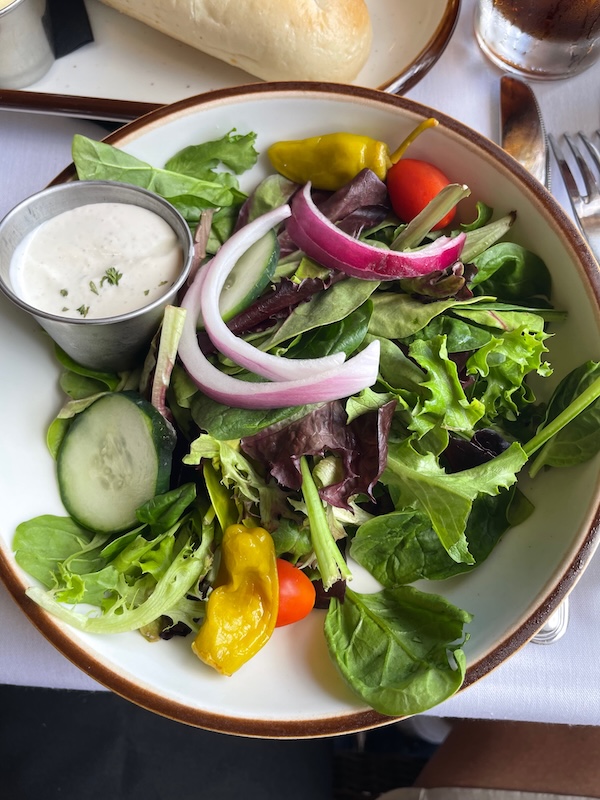 Fresh house salad with garlic parmesan dressing