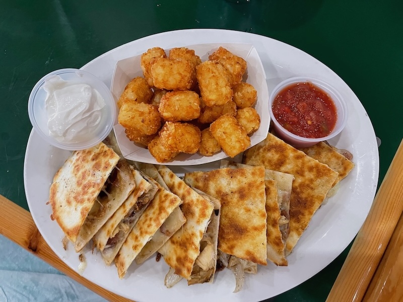 Philly cheesesteak quesadilla served with tater tots at Gator's Dockside Brownwood