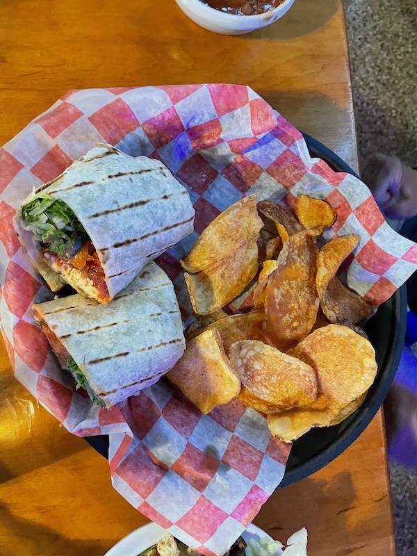 The Cove chicken wrap served with house-made potato chips