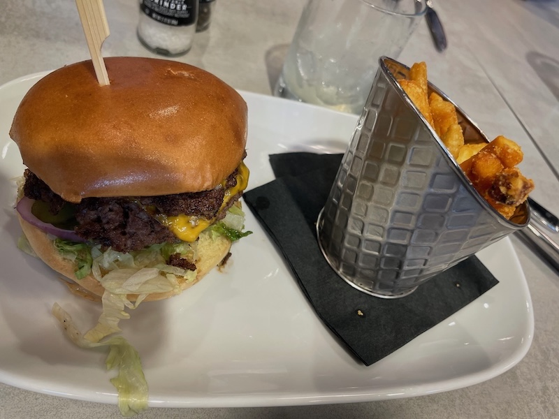 Smash burger and fries at Victory Sports Grill