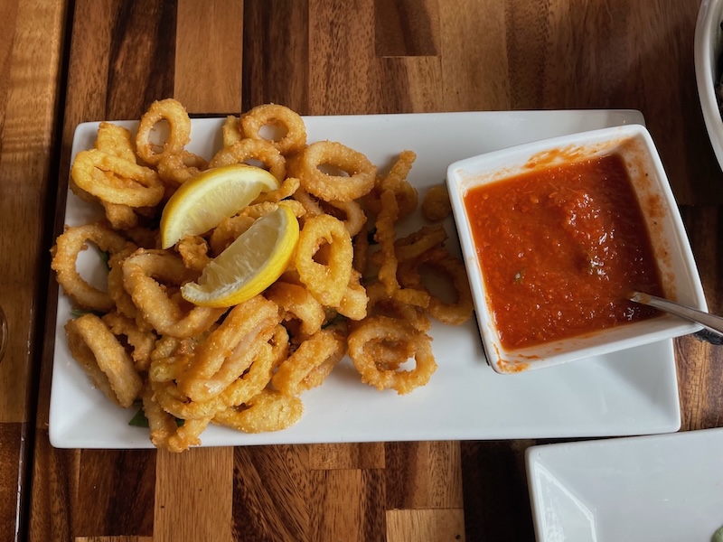 Calamari and banana peppers served with marinara at The Hangry Bison