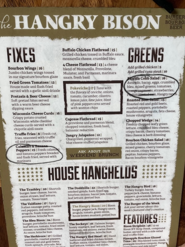 A Hangry Bison menu marked with a dry-erase marker showing food selections