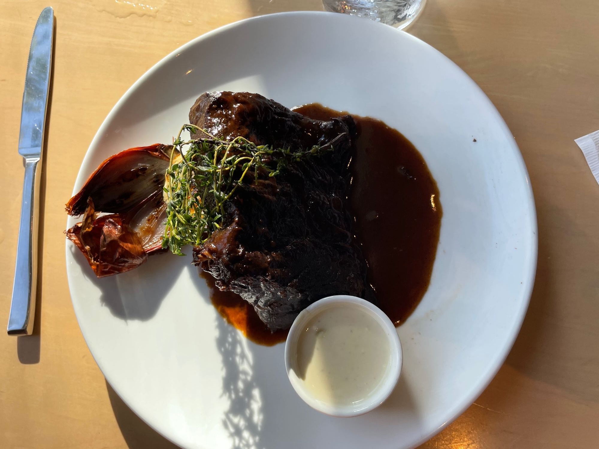 Red wine braised beef short rib at Wolfgang Puck Kitchen + Bar in Brownwood