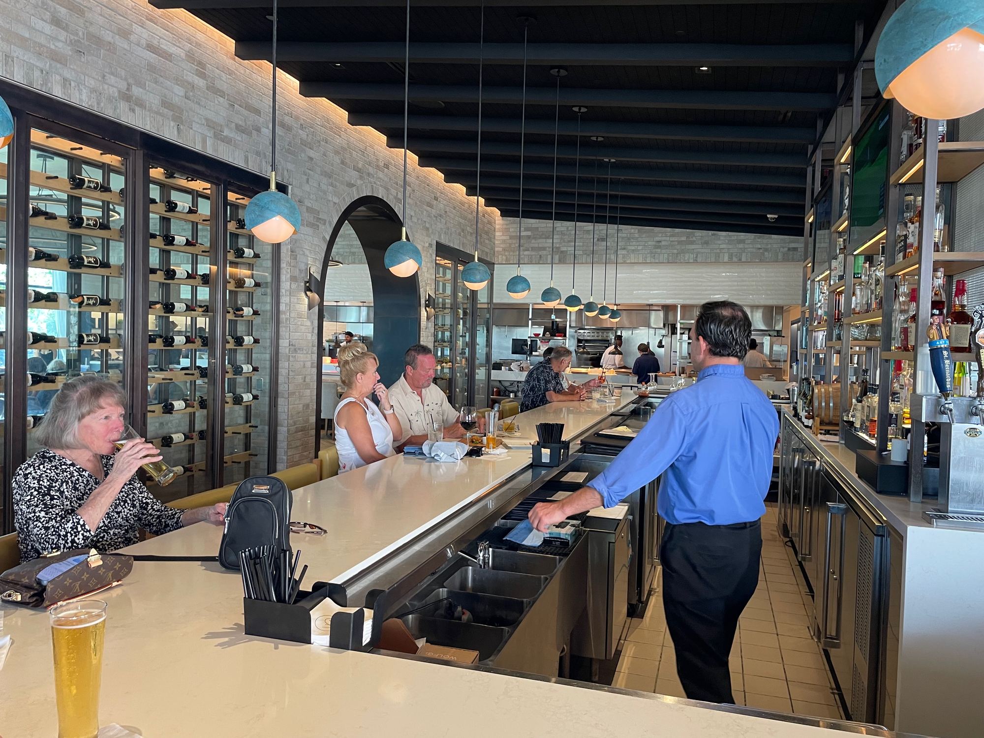Bar area at Wolfgang Puck Kitchen + Bar in Brownwood